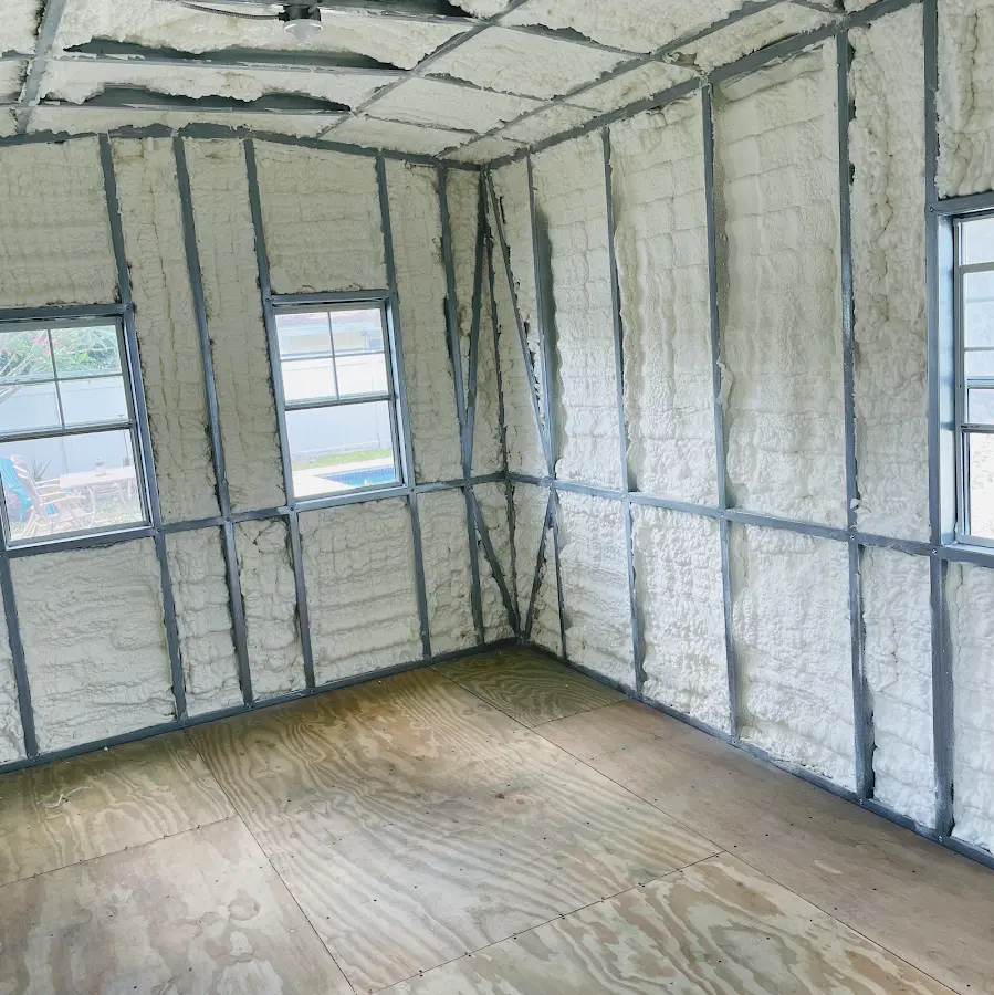 Closed-cell spray foam insulation applied to wall cavities in a residential project in Bradenton